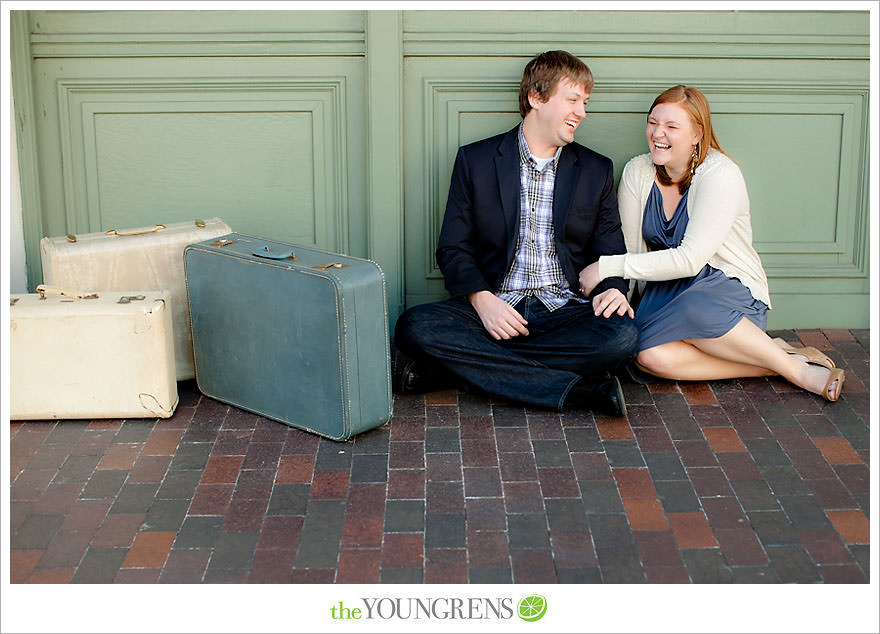 travel themed engagement session, san diego engagement session, engagement session with suitcases, san diego downtown engagement session, train station engagement session