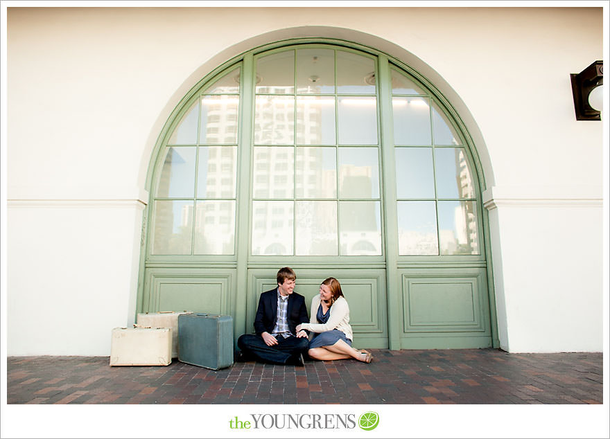 travel themed engagement session, san diego engagement session, engagement session with suitcases, san diego downtown engagement session, train station engagement session