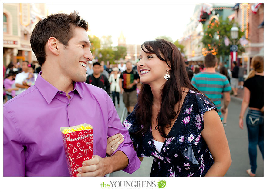 Disneyland engagement session, engagement at Disney, Disney themed engagement, theme park engagement session, engagement with Disney castle, cotton candy engagement, popcorn engagement