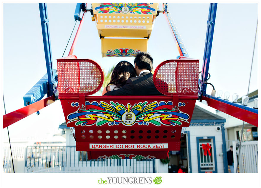 Balboa Island engagement session, carnival engagement session, beach engagement session, pier engagement session, sunset engagement photos, Newport Beach engagement session, arcade engagement session, Vietnamese engagement session