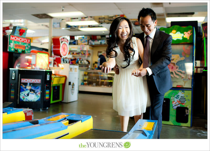 Balboa Island engagement session, carnival engagement session, beach engagement session, pier engagement session, sunset engagement photos, Newport Beach engagement session, arcade engagement session, Vietnamese engagement session