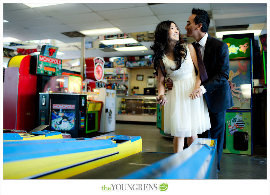 Balboa Island engagement session, carnival engagement session, beach engagement session, pier engagement session, sunset engagement photos, Newport Beach engagement session, arcade engagement session, Vietnamese engagement session