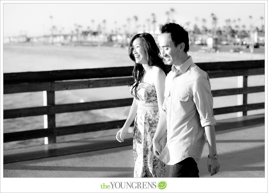 Balboa Island engagement session, carnival engagement session, beach engagement session, pier engagement session, sunset engagement photos, Newport Beach engagement session, arcade engagement session, Vietnamese engagement session