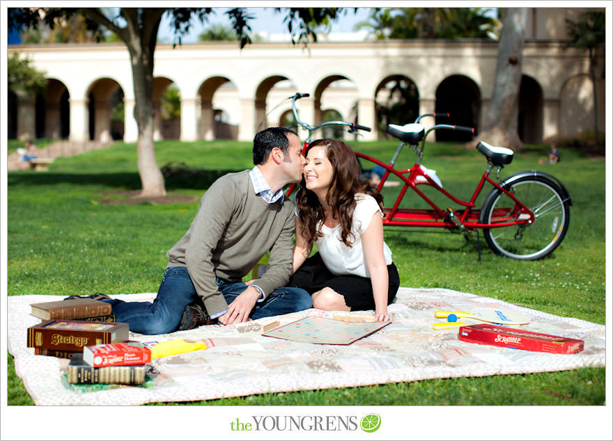 Balboa Park engagment, game board engagement, tandem bike engagement, San Diego engagement, Scrabble engagement, Stratego engagement, game engagement, picnic engagement, bike engagement