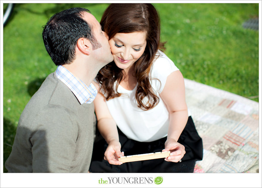 Balboa Park engagment, game board engagement, tandem bike engagement, San Diego engagement, Scrabble engagement, Stratego engagement, game engagement, picnic engagement, bike engagement