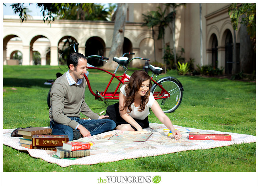 Balboa Park engagment, game board engagement, tandem bike engagement, San Diego engagement, Scrabble engagement, Stratego engagement, game engagement, picnic engagement, bike engagement