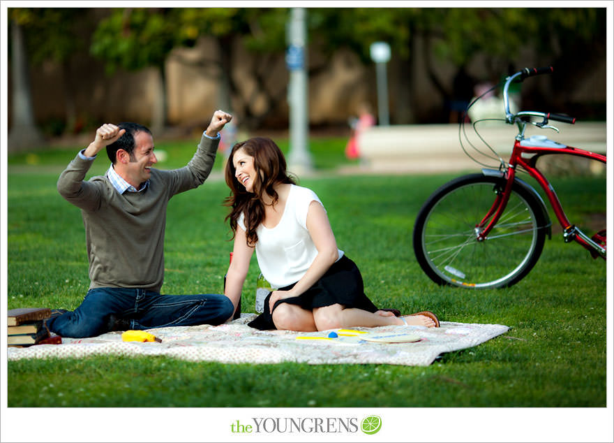 Balboa Park engagment, game board engagement, tandem bike engagement, San Diego engagement, Scrabble engagement, Stratego engagement, game engagement, picnic engagement, bike engagement