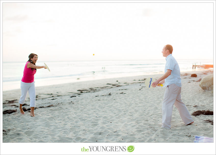 Encinitas engagement session, coffeehouse engagement session, Pannikin engagement session, beach engagement session, paddleboard engagement session, smashball engagement session, San Diego beach engagement session, coffee engagement session, Leucadia engagement session, sunset engagement session, pink engagement session, Swamis engagement session, Cardiff engagement session