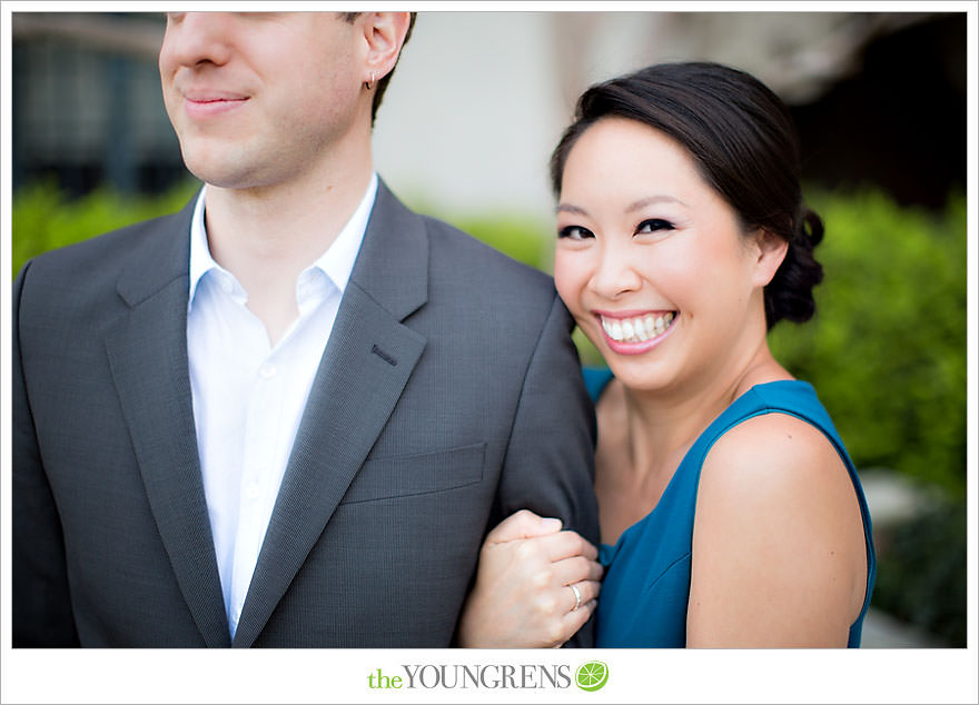 Balboa Park engagement session, Old Globe Theater engagement session, San Diego engagement session, Museum of Man engagement session, blue dress engagement session, grey suit engagement session, rose garden engagement session