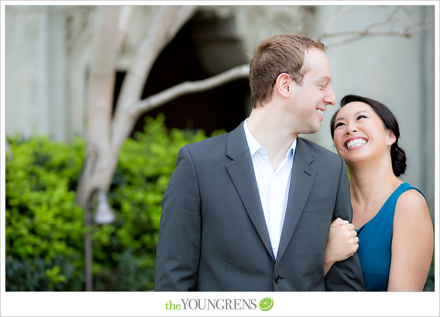 Balboa Park engagement session, Old Globe Theater engagement session, San Diego engagement session, Museum of Man engagement session, blue dress engagement session, grey suit engagement session, rose garden engagement session