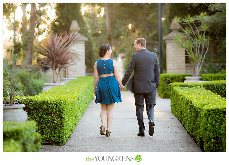 Balboa Park engagement session, Old Globe Theater engagement session, San Diego engagement session, Museum of Man engagement session, blue dress engagement session, grey suit engagement session, rose garden engagement session