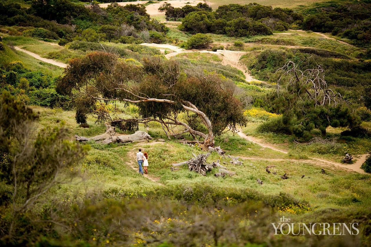 track and field engagement session, running engagement session, working out engagement, fitness engagement, running shoes engagement, PLNU engagement, Point Loma engagement, sunset cliffs engagement, swing engagement, meadow engagement, San Diego engagement, water bottle engagement, hot pink engagement