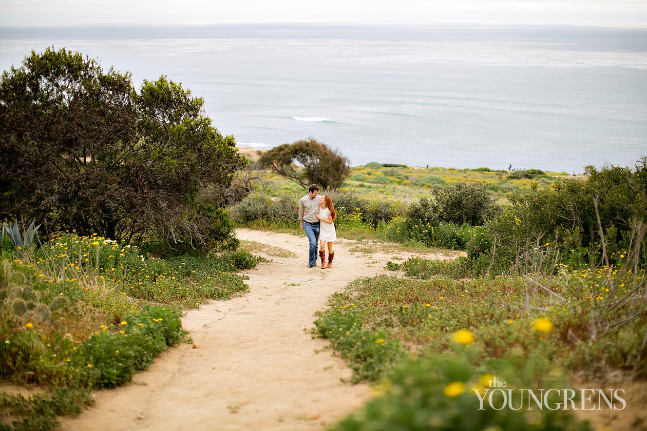 track and field engagement session, running engagement session, working out engagement, fitness engagement, running shoes engagement, PLNU engagement, Point Loma engagement, sunset cliffs engagement, swing engagement, meadow engagement, San Diego engagement, water bottle engagement, hot pink engagement