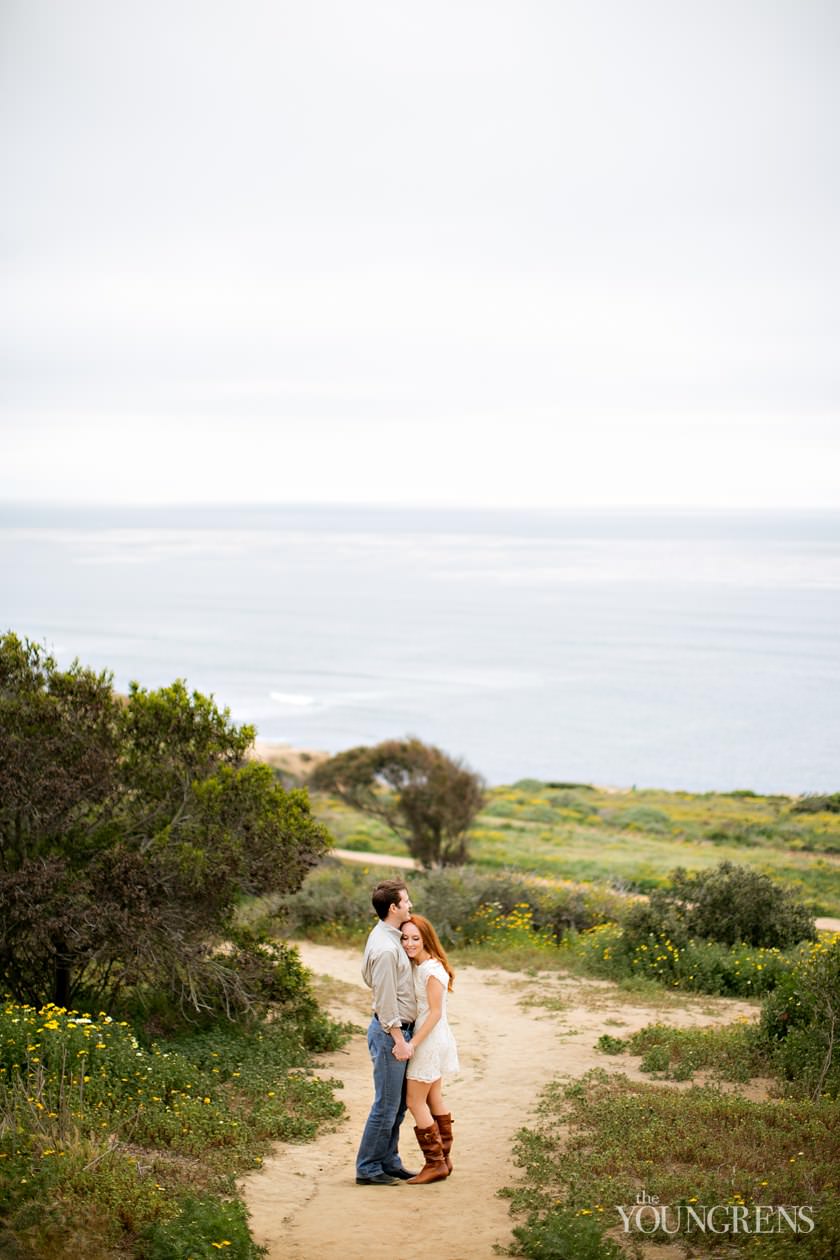 track and field engagement session, running engagement session, working out engagement, fitness engagement, running shoes engagement, PLNU engagement, Point Loma engagement, sunset cliffs engagement, swing engagement, meadow engagement, San Diego engagement, water bottle engagement, hot pink engagement