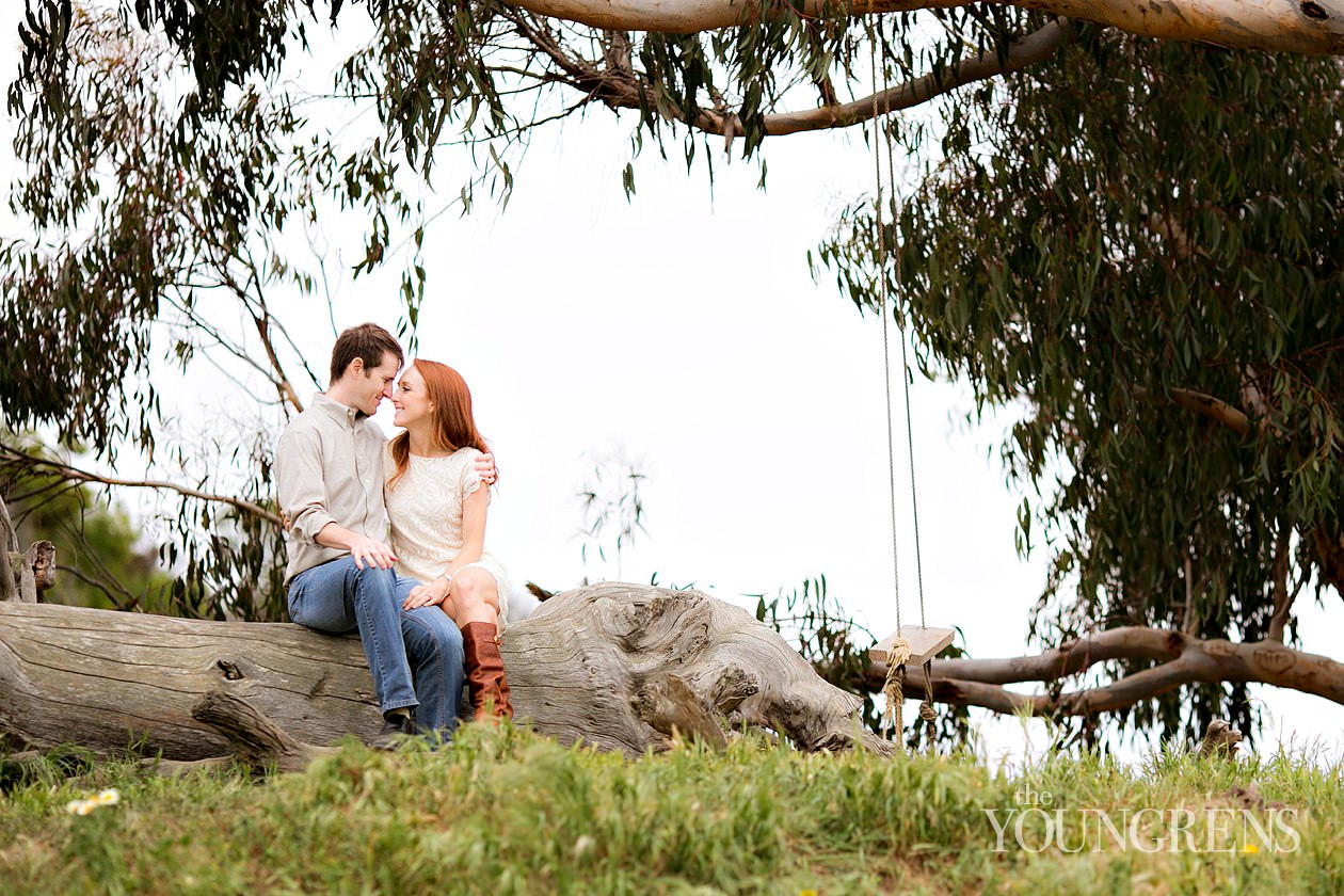 track and field engagement session, running engagement session, working out engagement, fitness engagement, running shoes engagement, PLNU engagement, Point Loma engagement, sunset cliffs engagement, swing engagement, meadow engagement, San Diego engagement, water bottle engagement, hot pink engagement