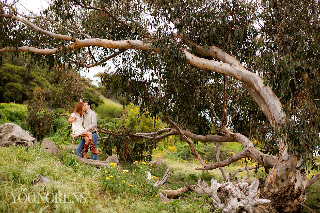 track and field engagement session, running engagement session, working out engagement, fitness engagement, running shoes engagement, PLNU engagement, Point Loma engagement, sunset cliffs engagement, swing engagement, meadow engagement, San Diego engagement, water bottle engagement, hot pink engagement