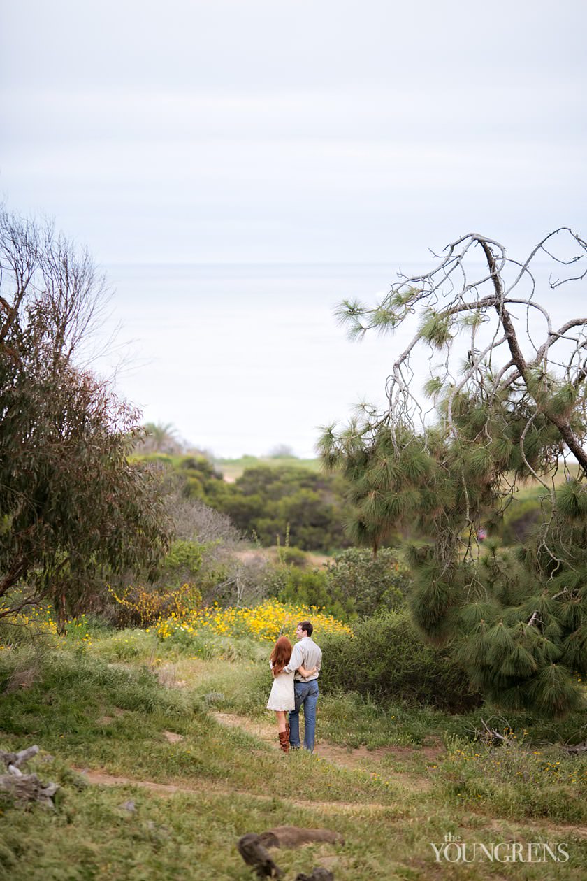 track and field engagement session, running engagement session, working out engagement, fitness engagement, running shoes engagement, PLNU engagement, Point Loma engagement, sunset cliffs engagement, swing engagement, meadow engagement, San Diego engagement, water bottle engagement, hot pink engagement