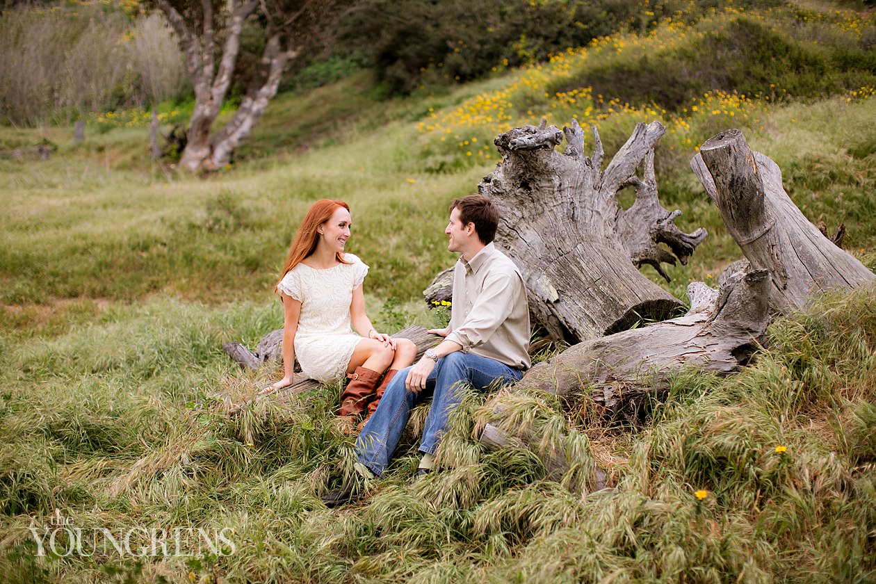 track and field engagement session, running engagement session, working out engagement, fitness engagement, running shoes engagement, PLNU engagement, Point Loma engagement, sunset cliffs engagement, swing engagement, meadow engagement, San Diego engagement, water bottle engagement, hot pink engagement