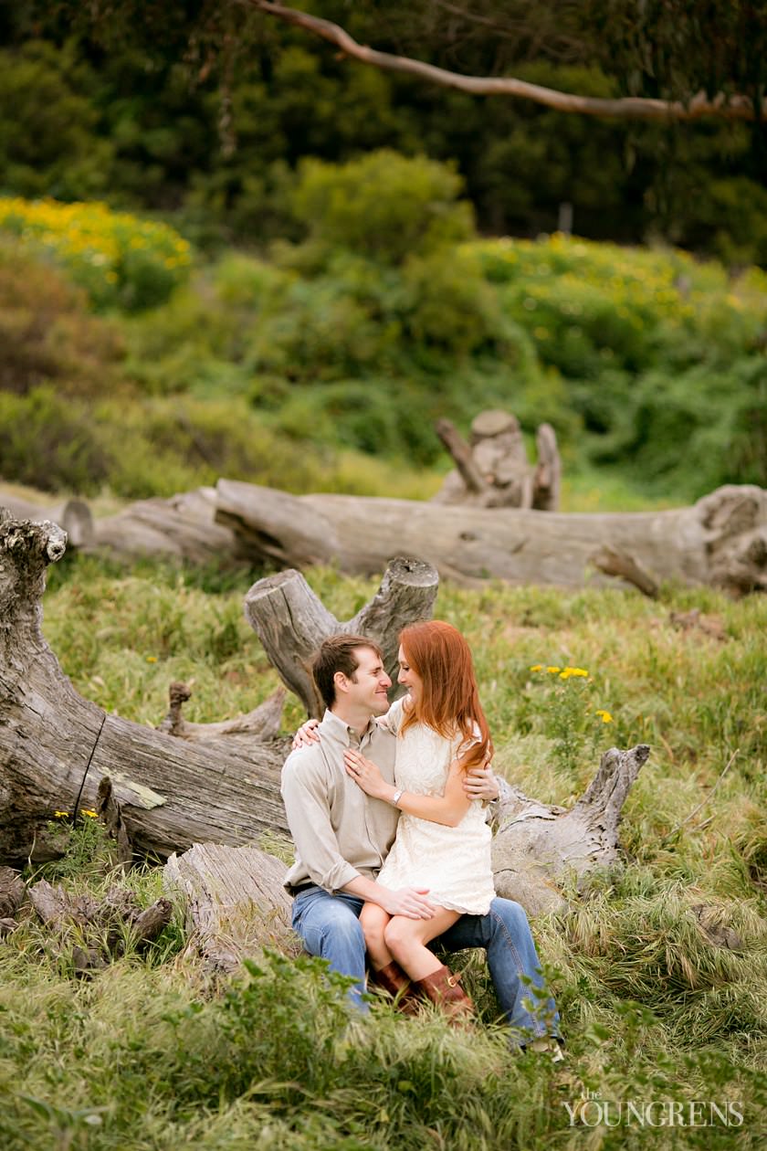 track and field engagement session, running engagement session, working out engagement, fitness engagement, running shoes engagement, PLNU engagement, Point Loma engagement, sunset cliffs engagement, swing engagement, meadow engagement, San Diego engagement, water bottle engagement, hot pink engagement