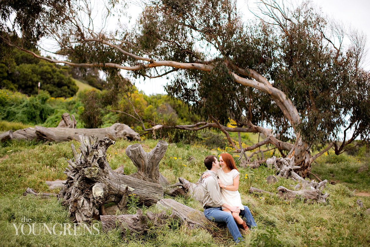 track and field engagement session, running engagement session, working out engagement, fitness engagement, running shoes engagement, PLNU engagement, Point Loma engagement, sunset cliffs engagement, swing engagement, meadow engagement, San Diego engagement, water bottle engagement, hot pink engagement