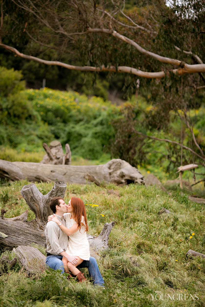 track and field engagement session, running engagement session, working out engagement, fitness engagement, running shoes engagement, PLNU engagement, Point Loma engagement, sunset cliffs engagement, swing engagement, meadow engagement, San Diego engagement, water bottle engagement, hot pink engagement