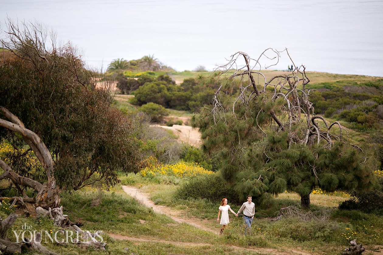 track and field engagement session, running engagement session, working out engagement, fitness engagement, running shoes engagement, PLNU engagement, Point Loma engagement, sunset cliffs engagement, swing engagement, meadow engagement, San Diego engagement, water bottle engagement, hot pink engagement