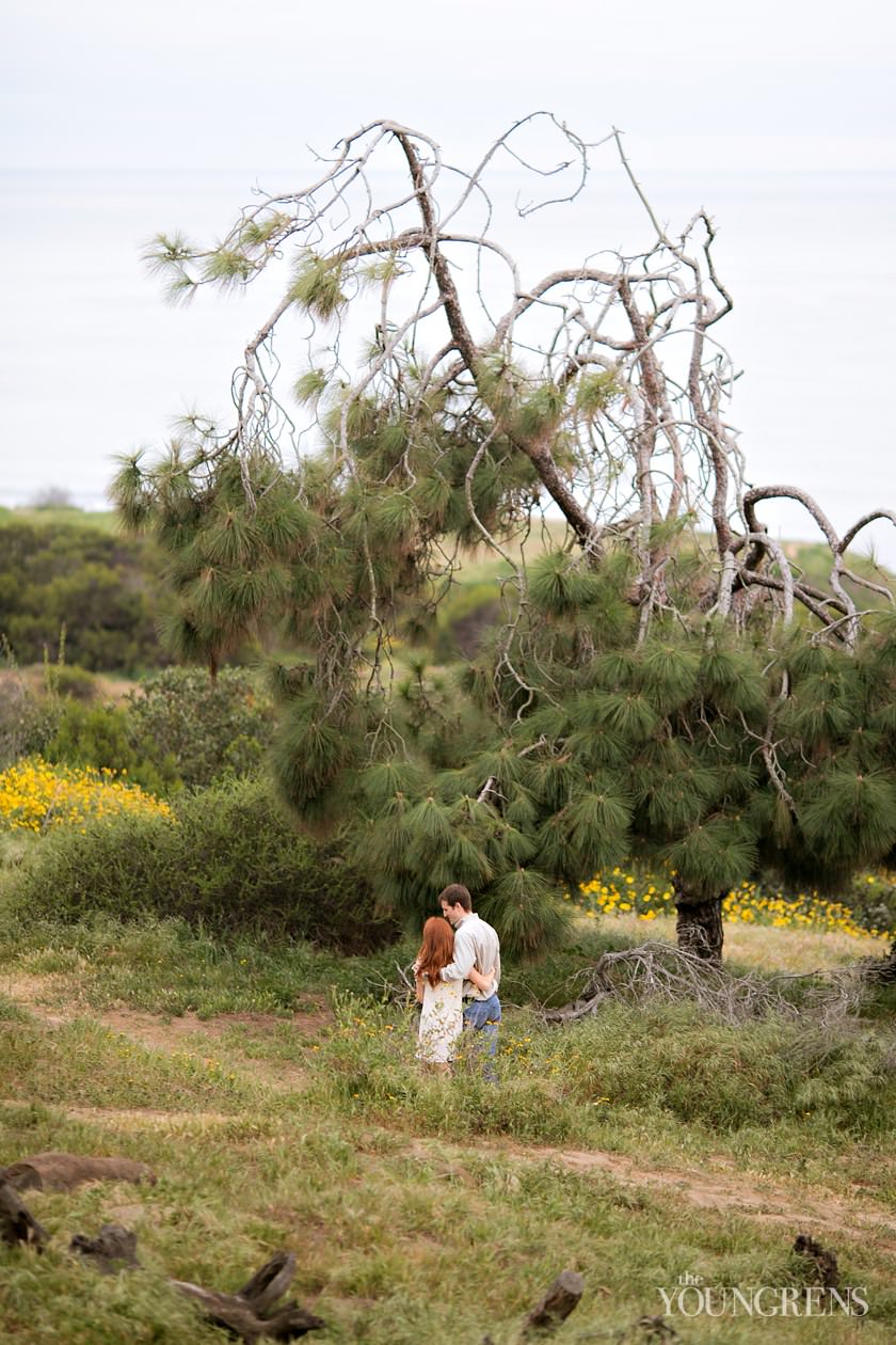 track and field engagement session, running engagement session, working out engagement, fitness engagement, running shoes engagement, PLNU engagement, Point Loma engagement, sunset cliffs engagement, swing engagement, meadow engagement, San Diego engagement, water bottle engagement, hot pink engagement